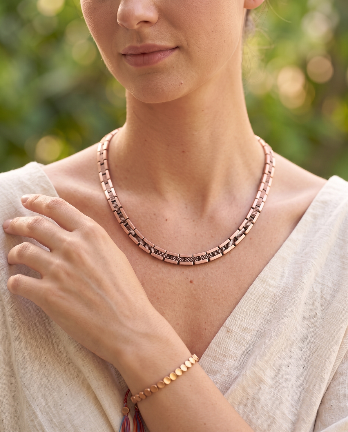 Woman wearing the Copper Shield Magnetic Necklace