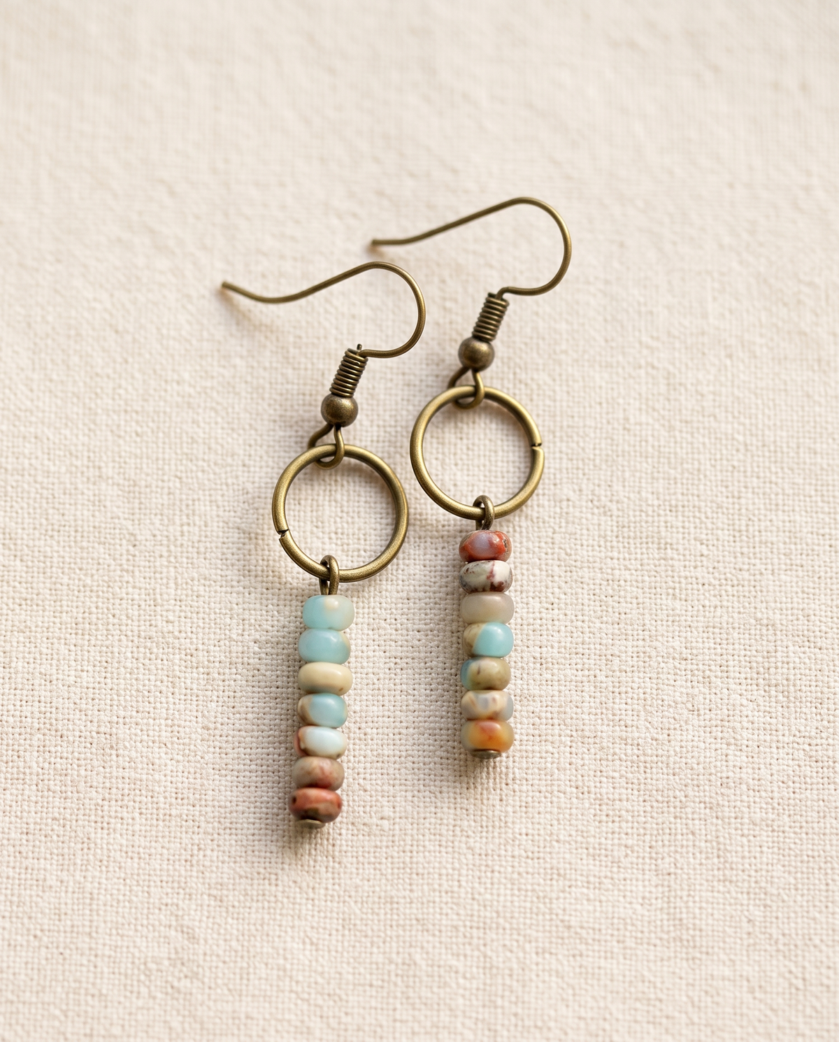 Amazonite Strength Earrings on warm cream linen