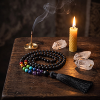 Matte Black mala with candlelight and crystals